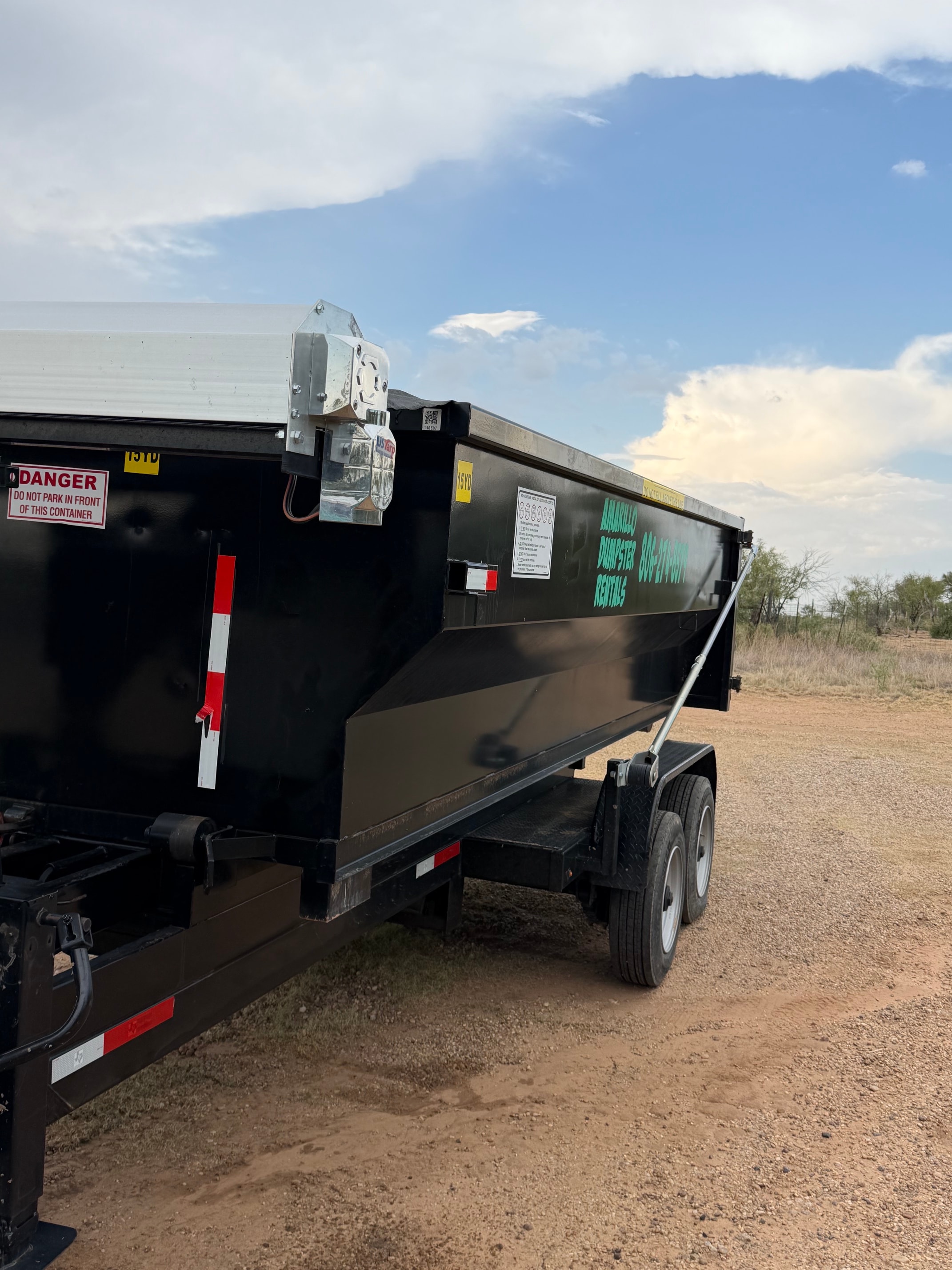 Dumpster Staged — Dirt Road Job Site — Texas Panhandle